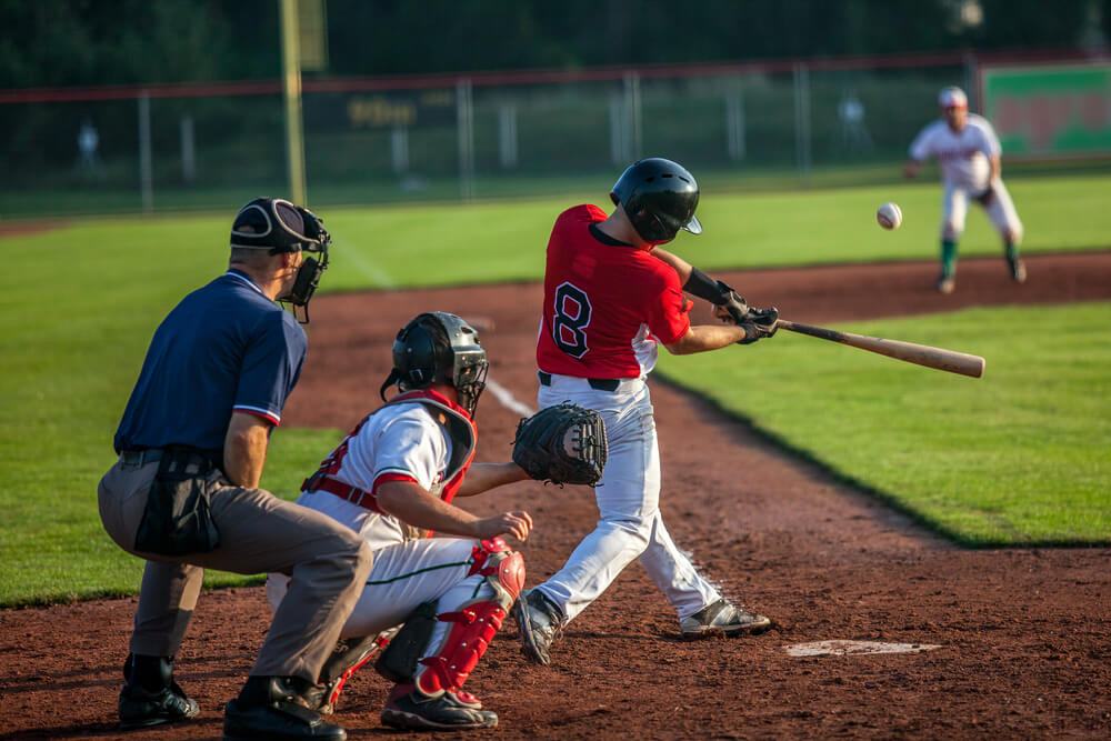 Youth baseball player hits