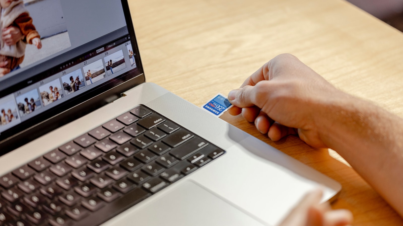 Person working on laptop — AI tools for e-commerce
