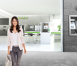 Woman in front of bank branch