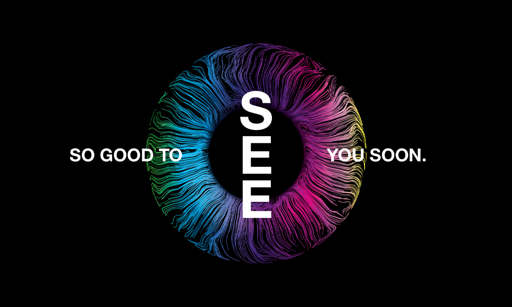 IDS 2025 sujet: Black background with colorful iris and white lettering in the foreground. IDS 2025 sujet: Black background with colorful iris and white lettering in the foreground.