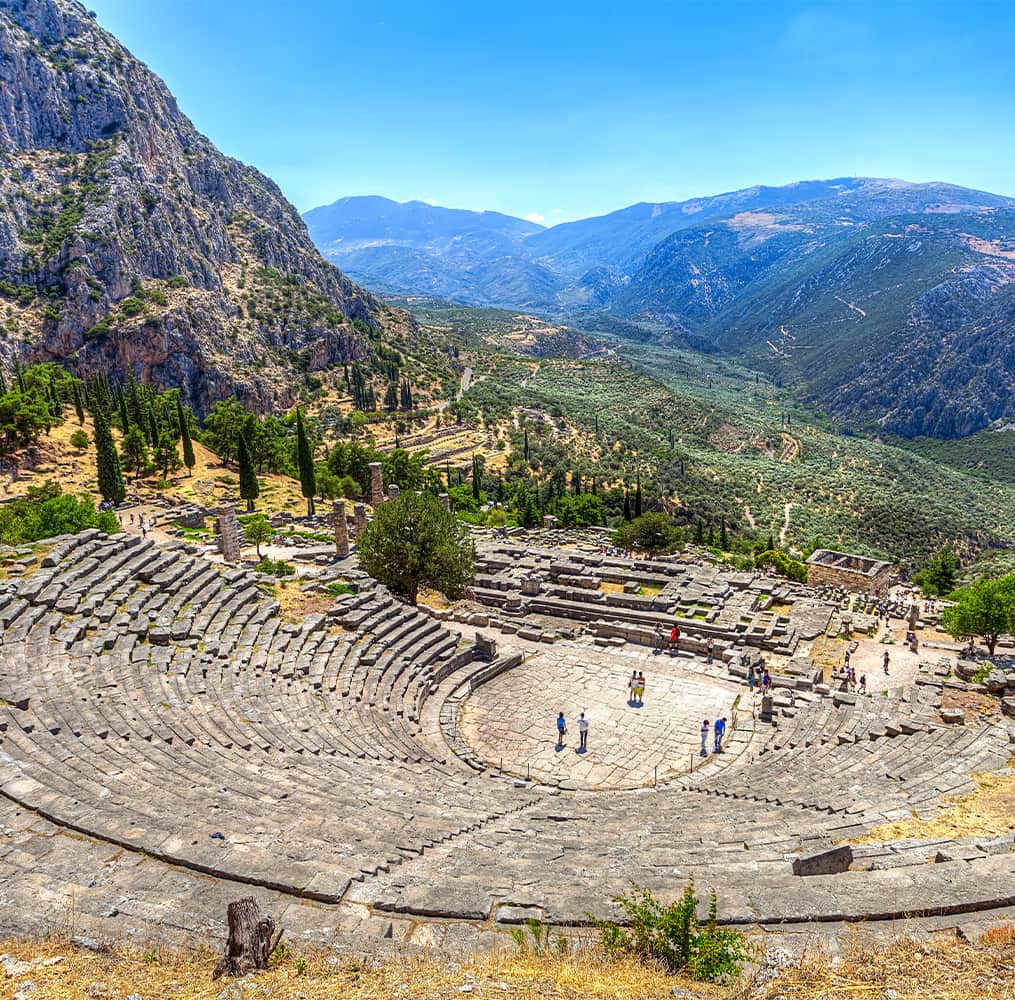 Ancient ruins of rows of stairs built in a semi circle located high in the mountains