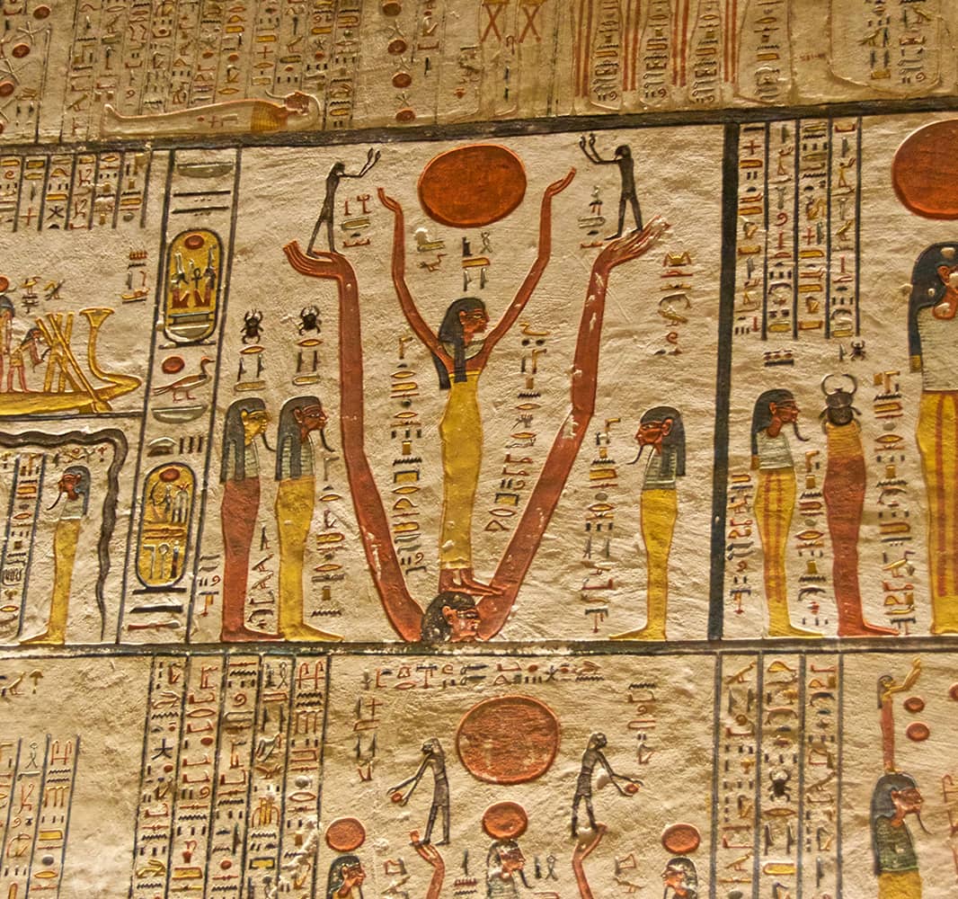 Colorful pictures and hieroglyphics on tiles