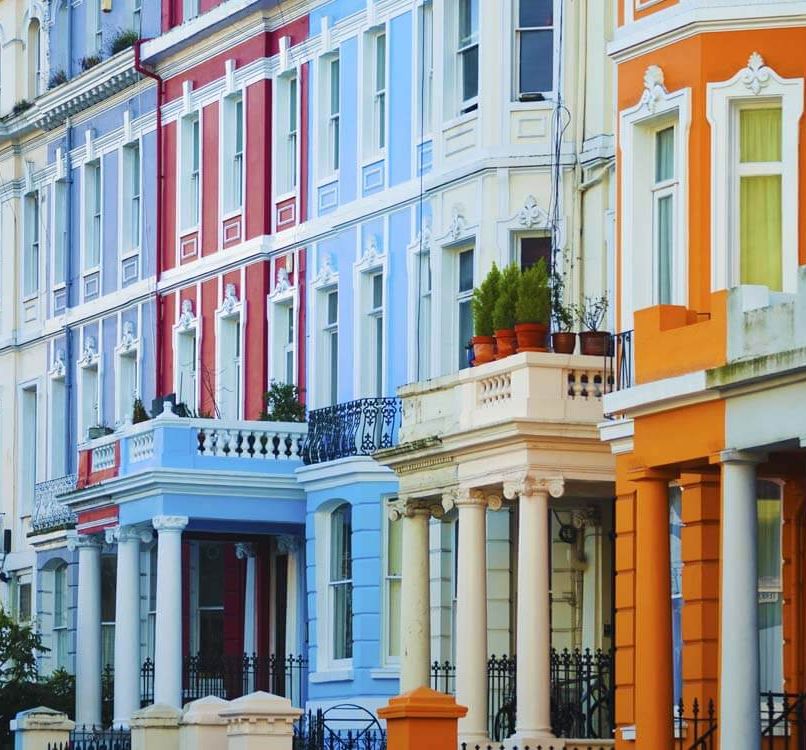 A row of colorful townhouses