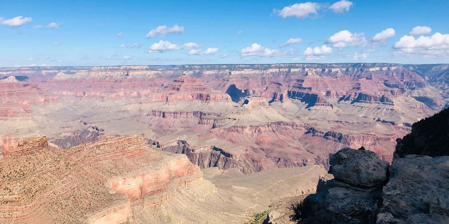 Travelers walking along a staircase at the Grand Canyon