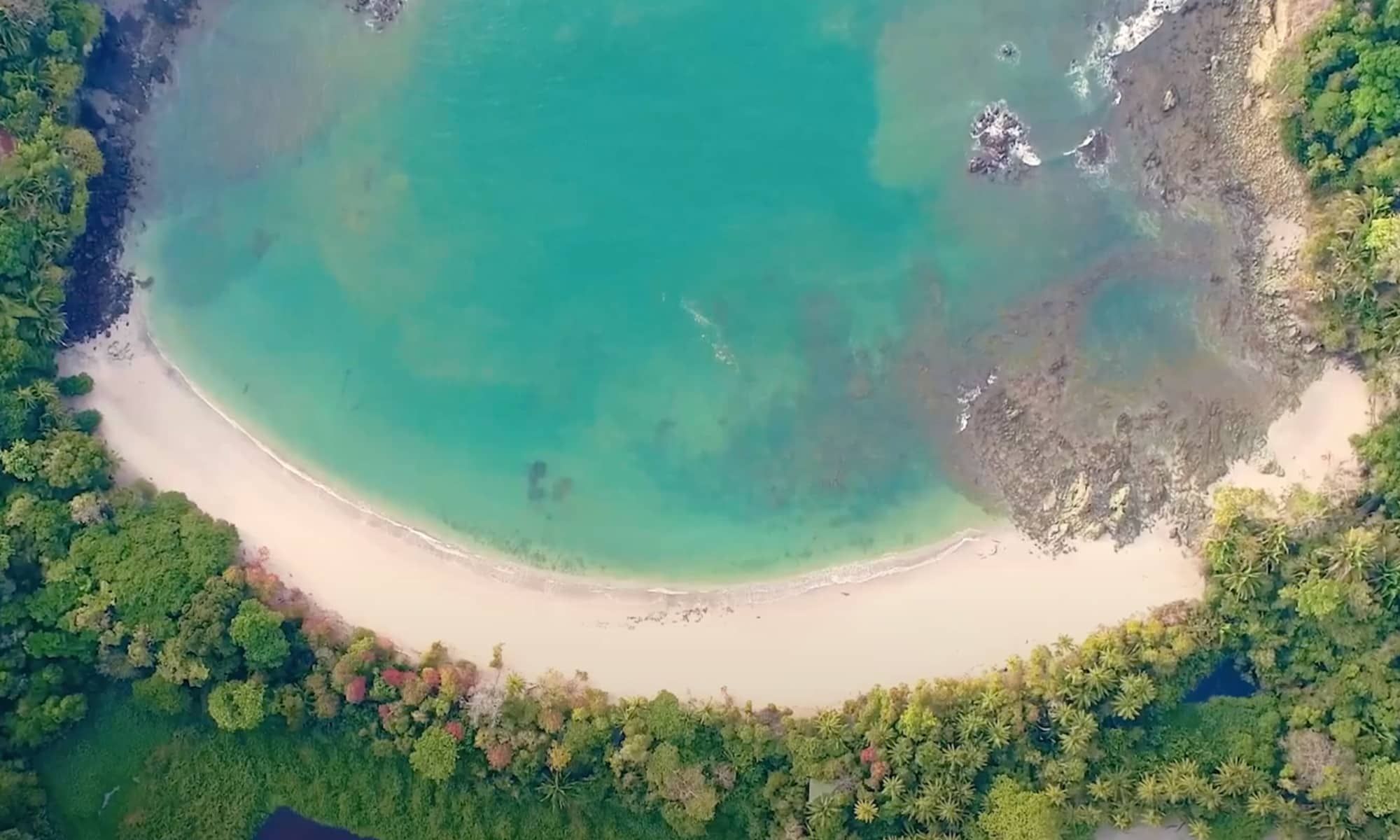 An aerial view of an empty beach shore