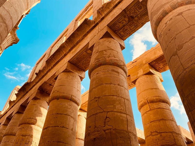 Columns from the remains of an Egyptian temple with hieroglyphic carvings