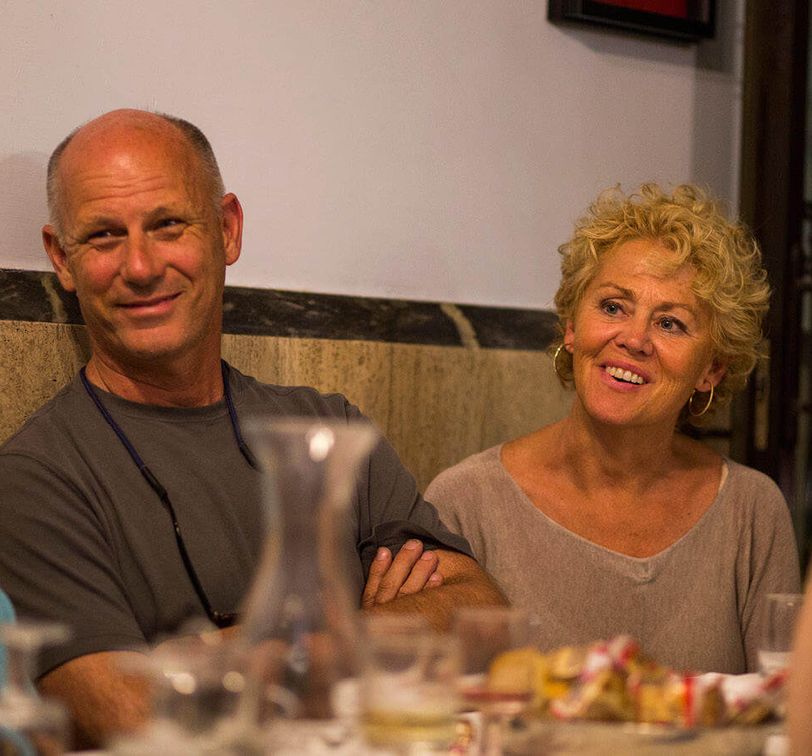 group of four people sitting at dinner table