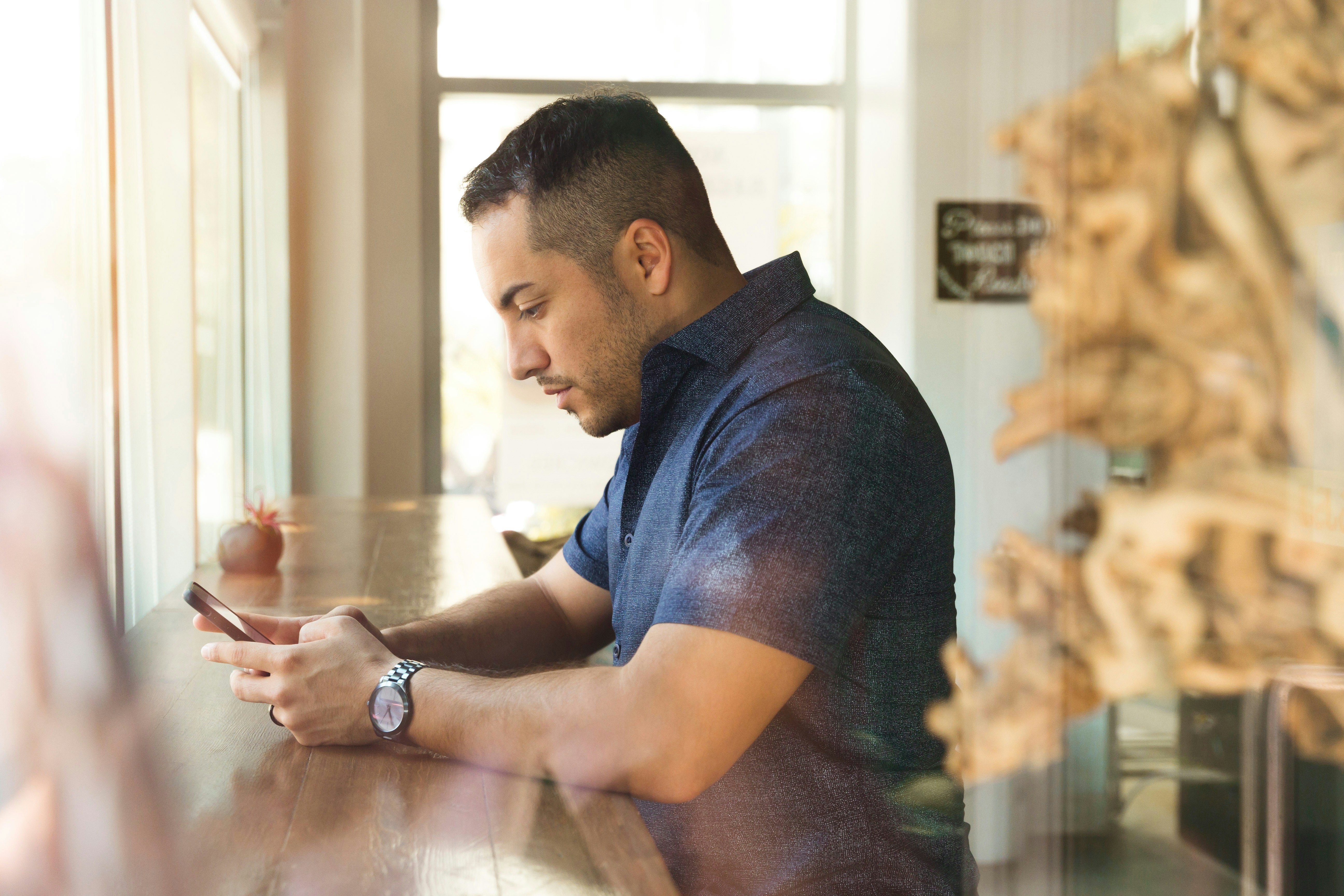 Hourly worker checking shift details on a smartphone