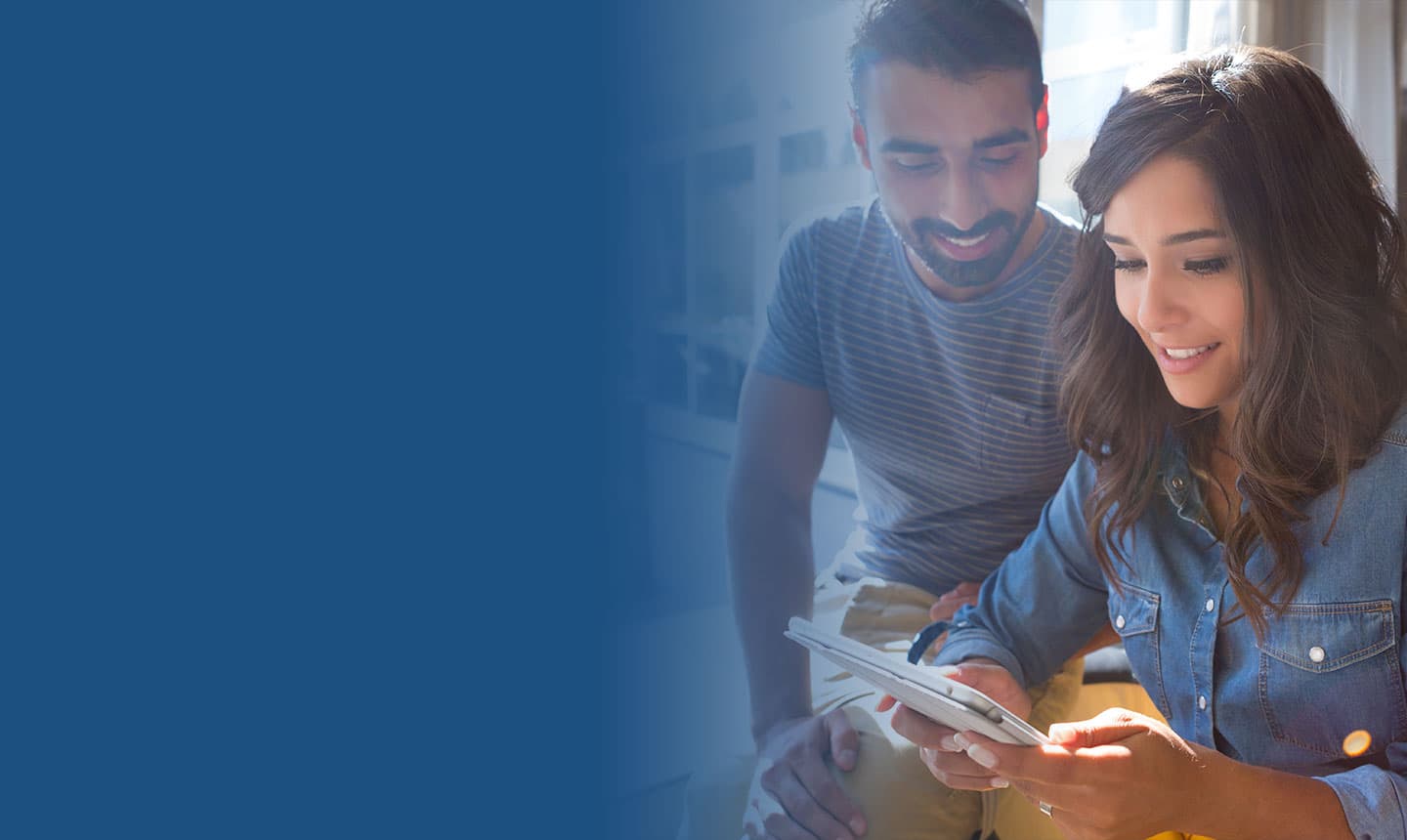 Couple looking at tablet