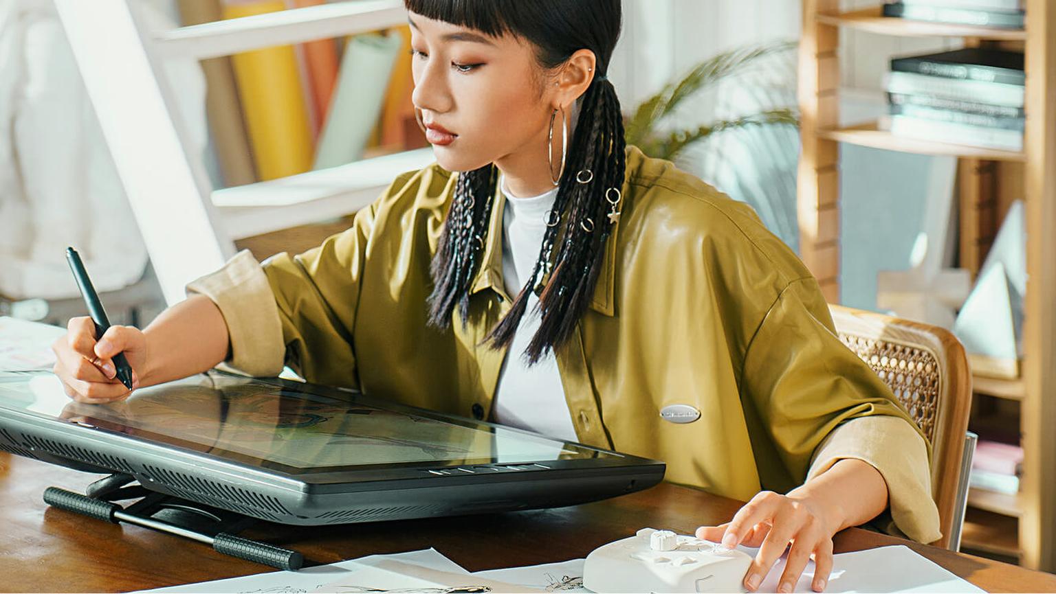 An intern working during her graphic design internship in Auckland