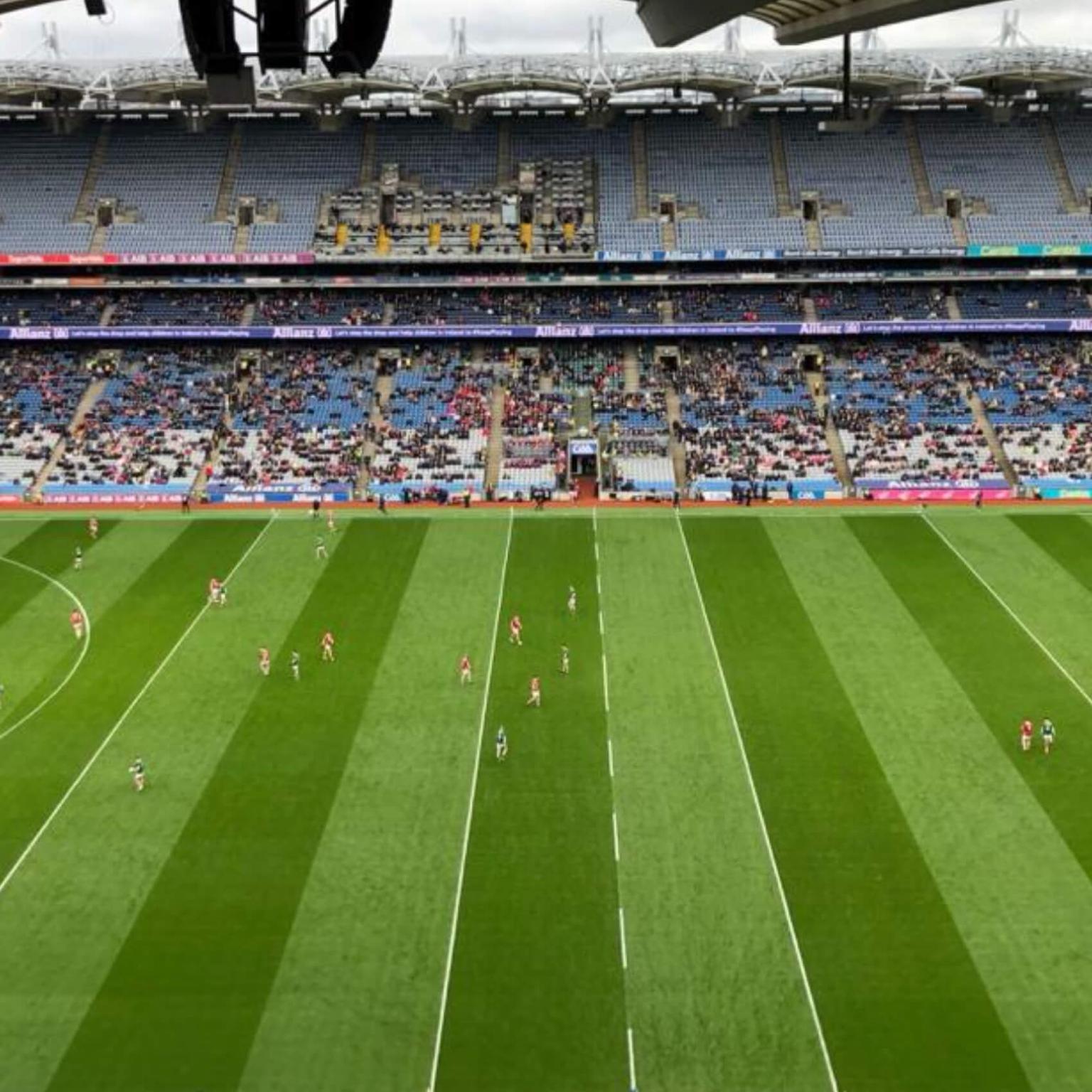 Intern Fina visiting a match of her employer, an Irish professional football club