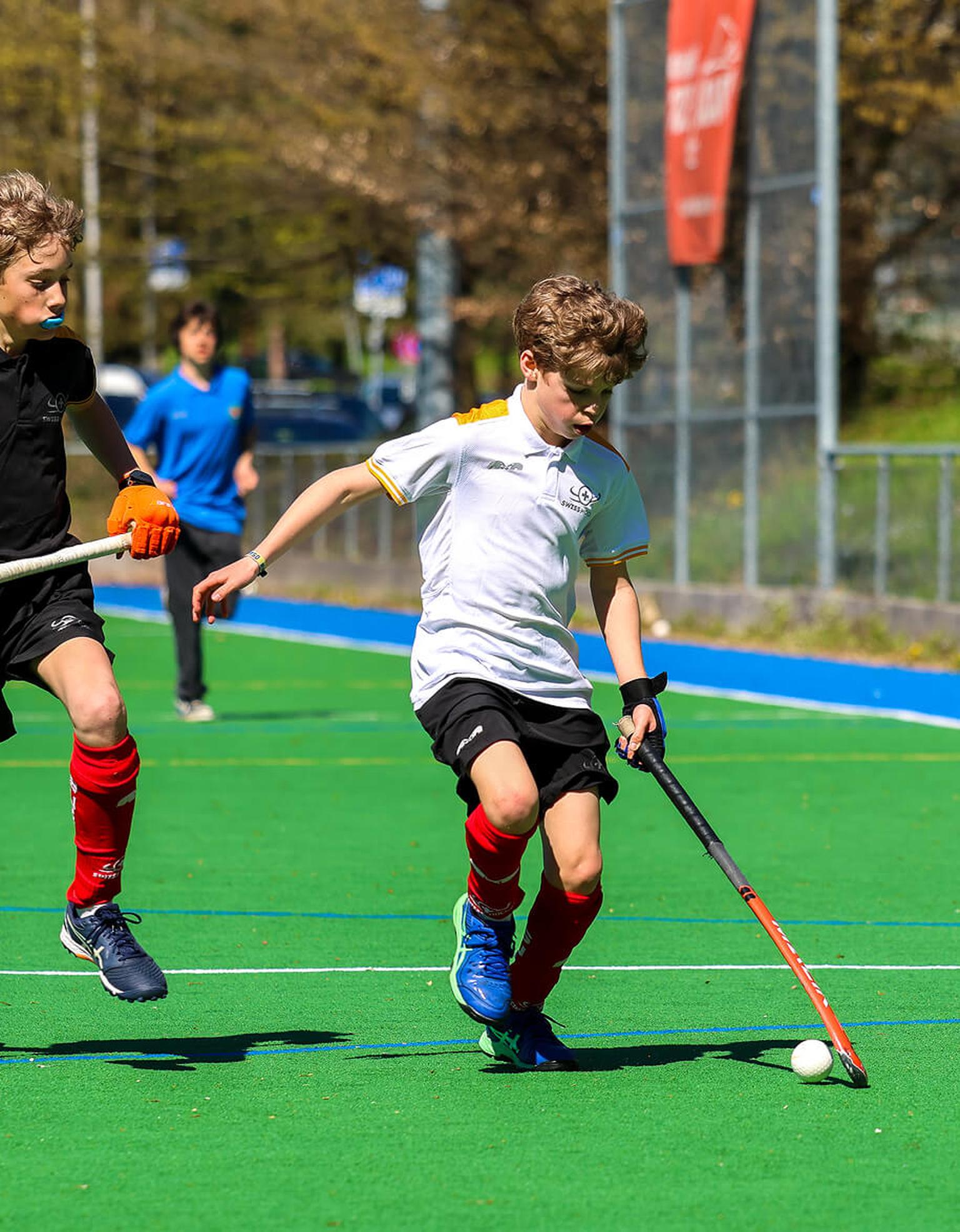 Jugador de hockey suizo que se beneficia de la digitalización de la asociación con planet.training