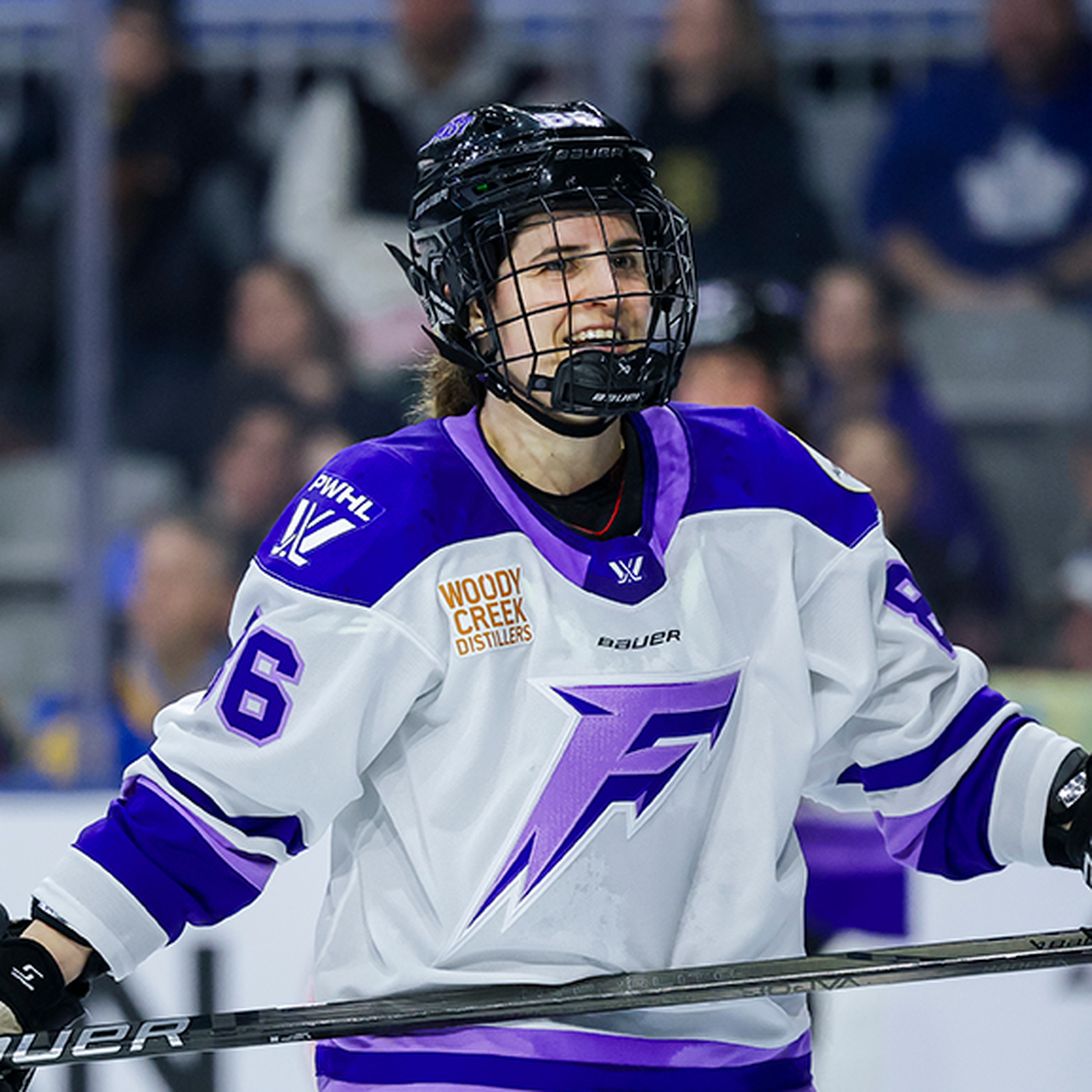 Michela Cava smiling in a Minnesota Frost jersey
