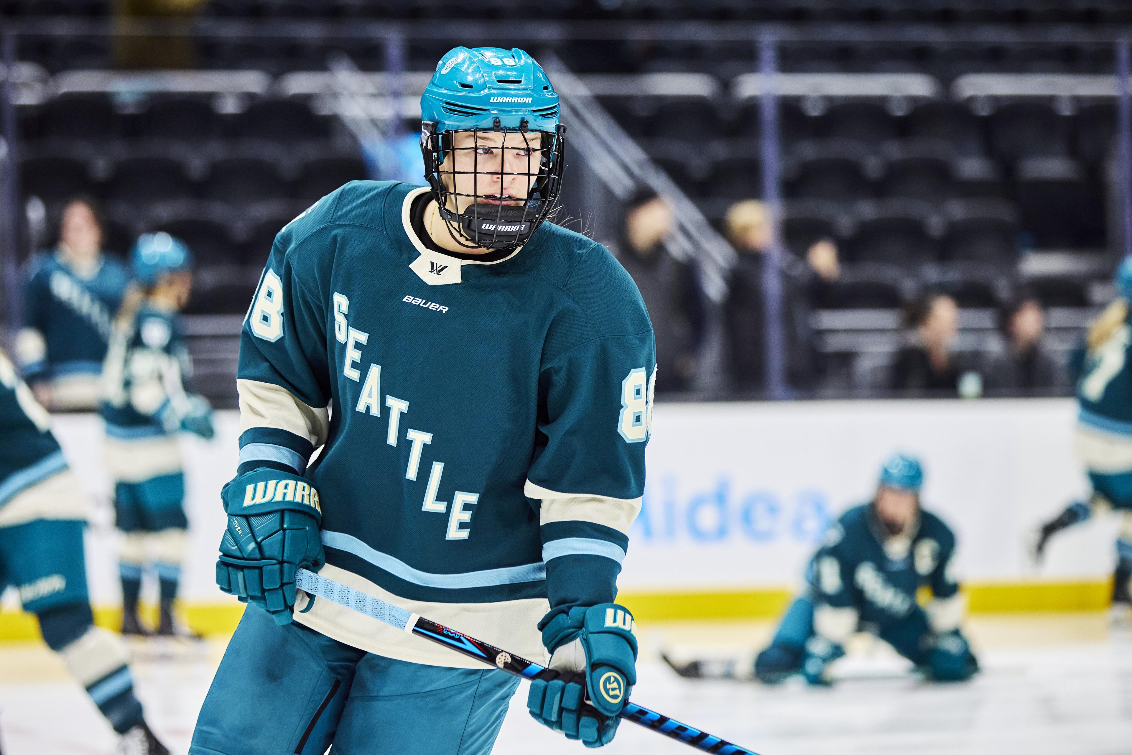 Julia Gosling in a teal Seattle jersey during warm-up.
