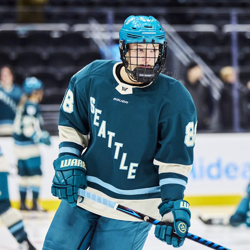 Julia Gosling in a teal Seattle jersey during warm-up.