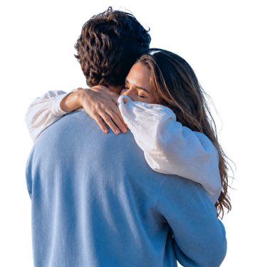man and woman hugging