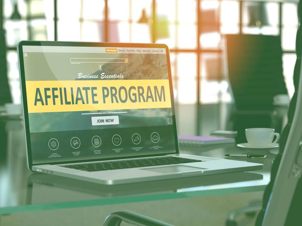 Laptop showing an affiliate program webpage