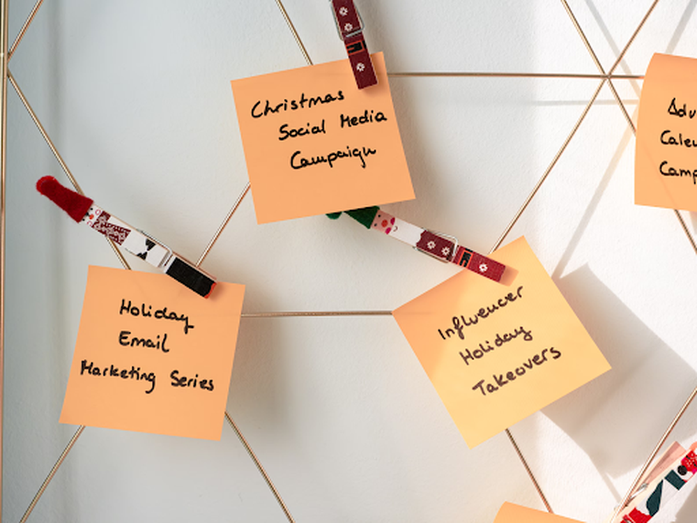 e-commerce marketing-related sticky notes on a peg board