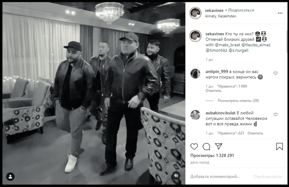 Four men walking around a house