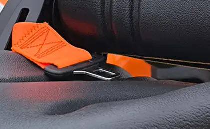 Detail picture MGV55 UnitedSeats construction seat orange seat belt