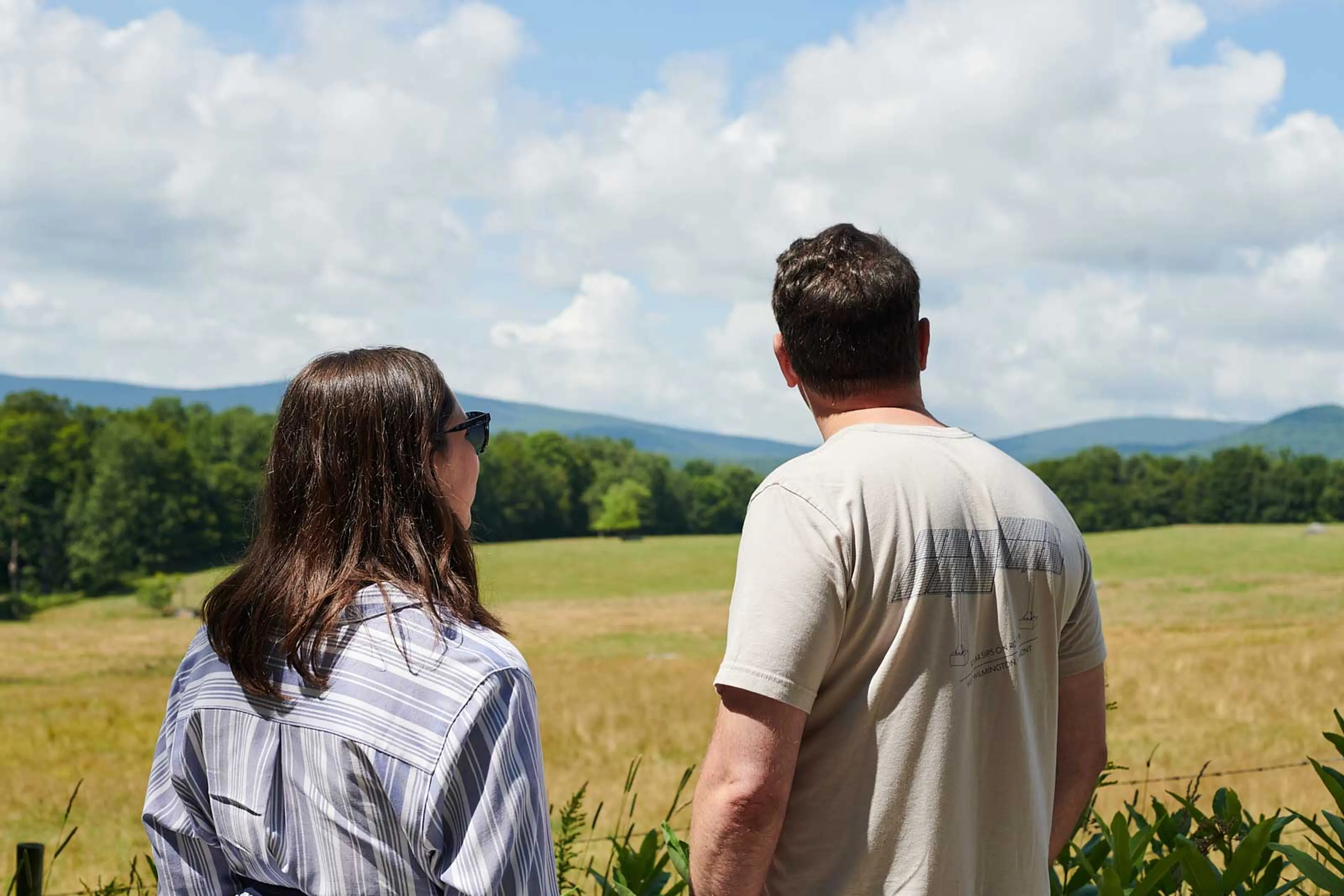 Chrystal and Brian Holt looking out into a field
