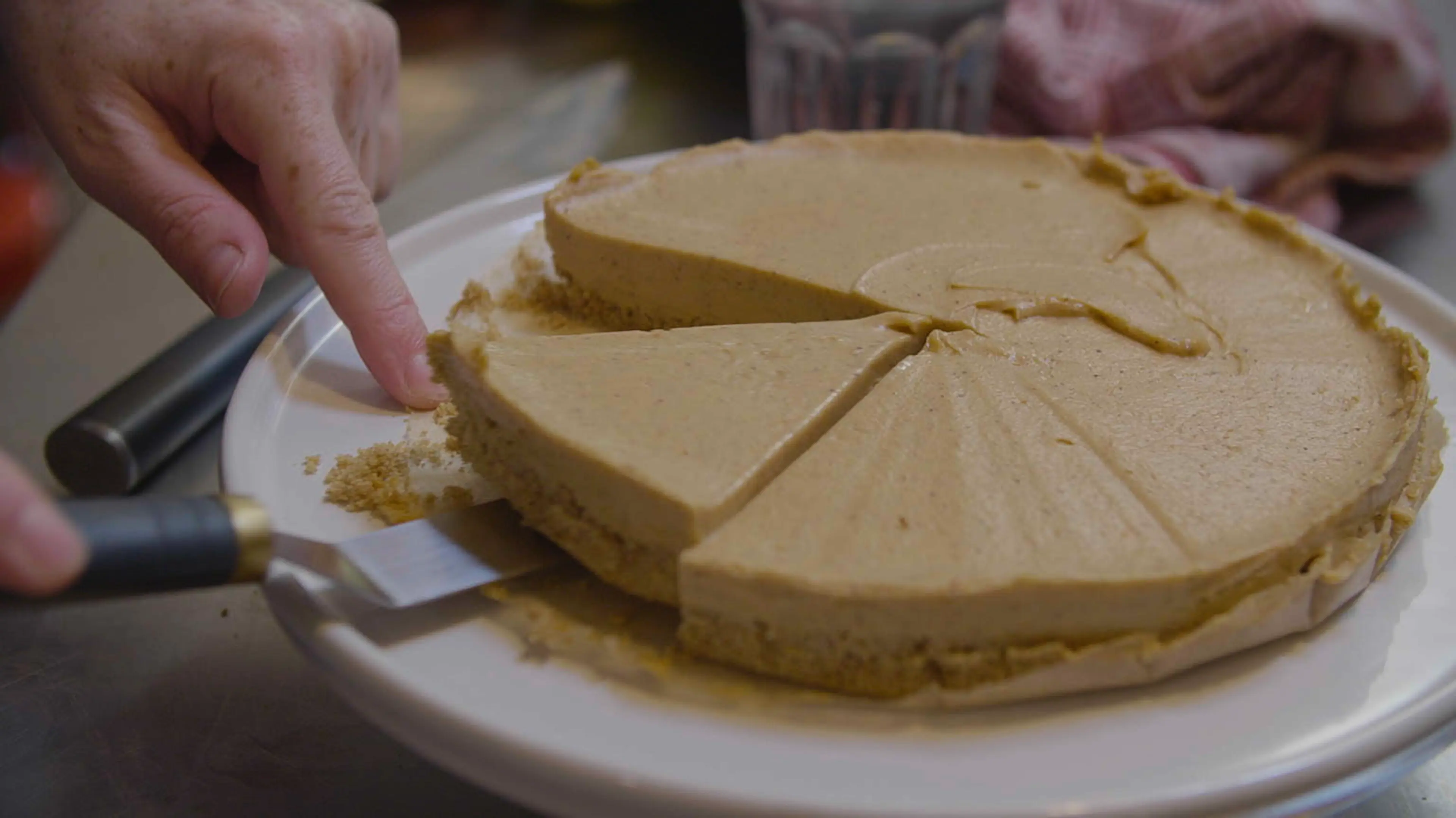 A sliced cheesecake.