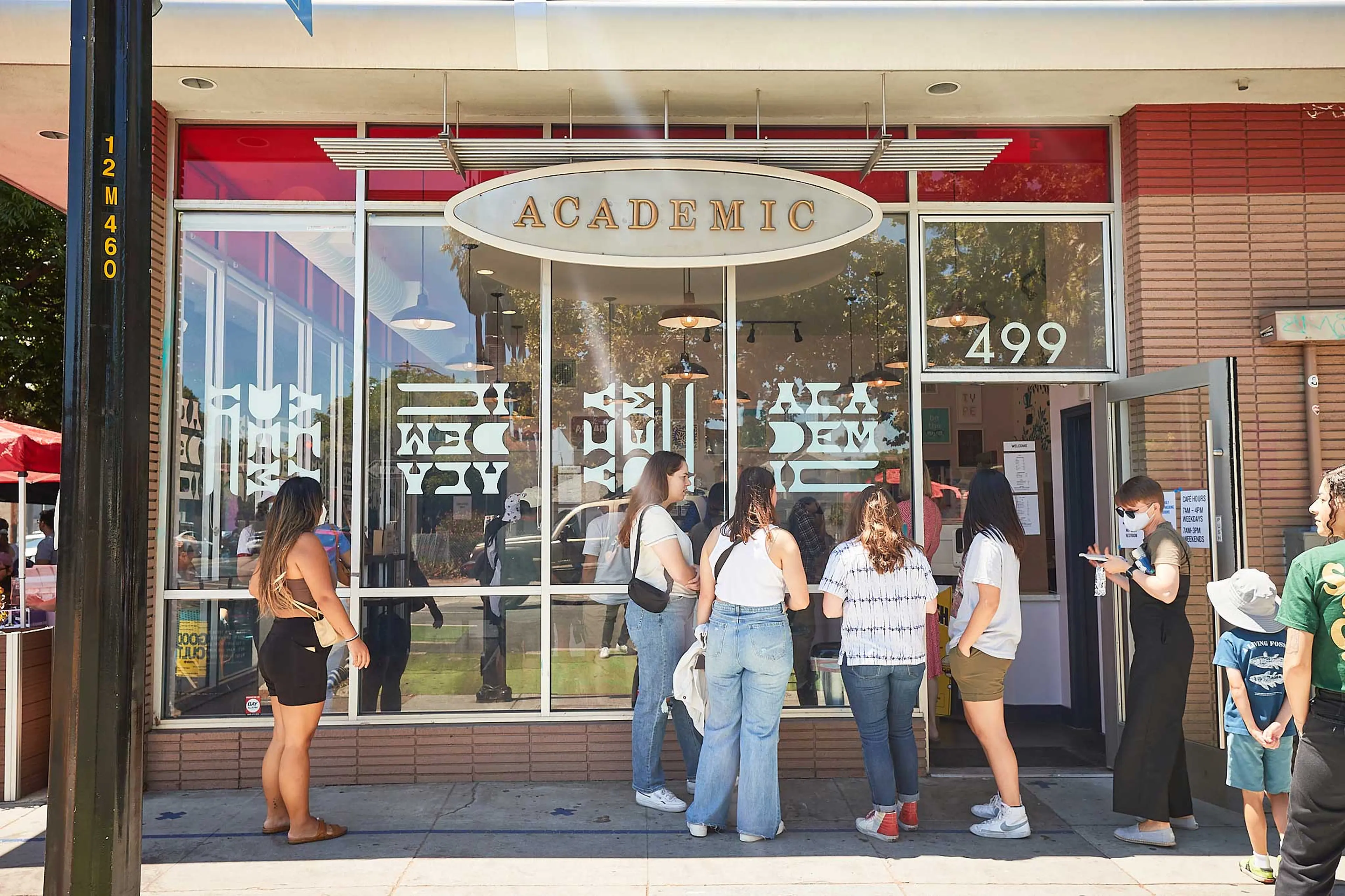 Customers waiting outside Academic Coffee Shop