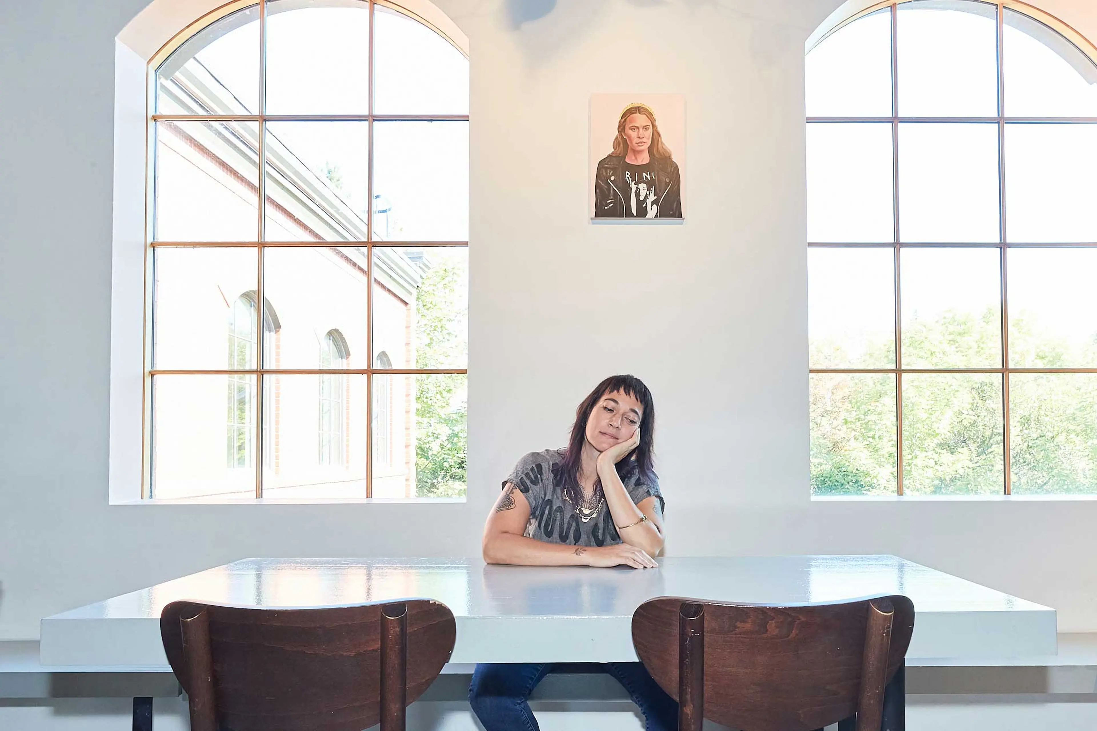 Lady falling asleep at a table