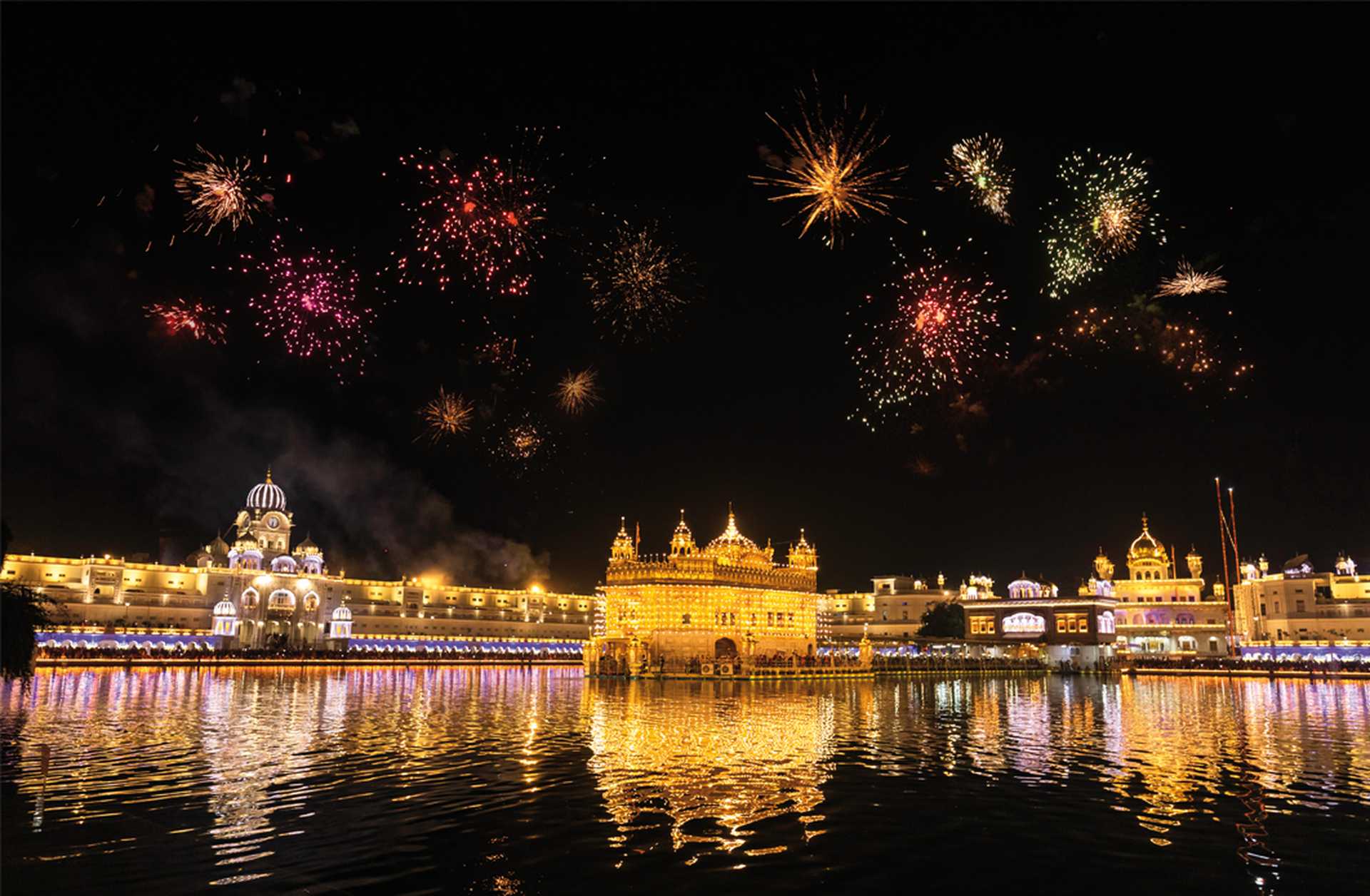 Golden Temple Amritsar lit by Diya and fire crackers