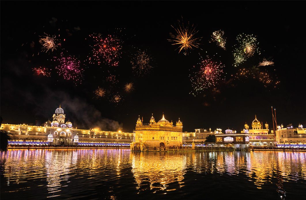 Golden Temple Amritsar lit by Diya and fire crackers