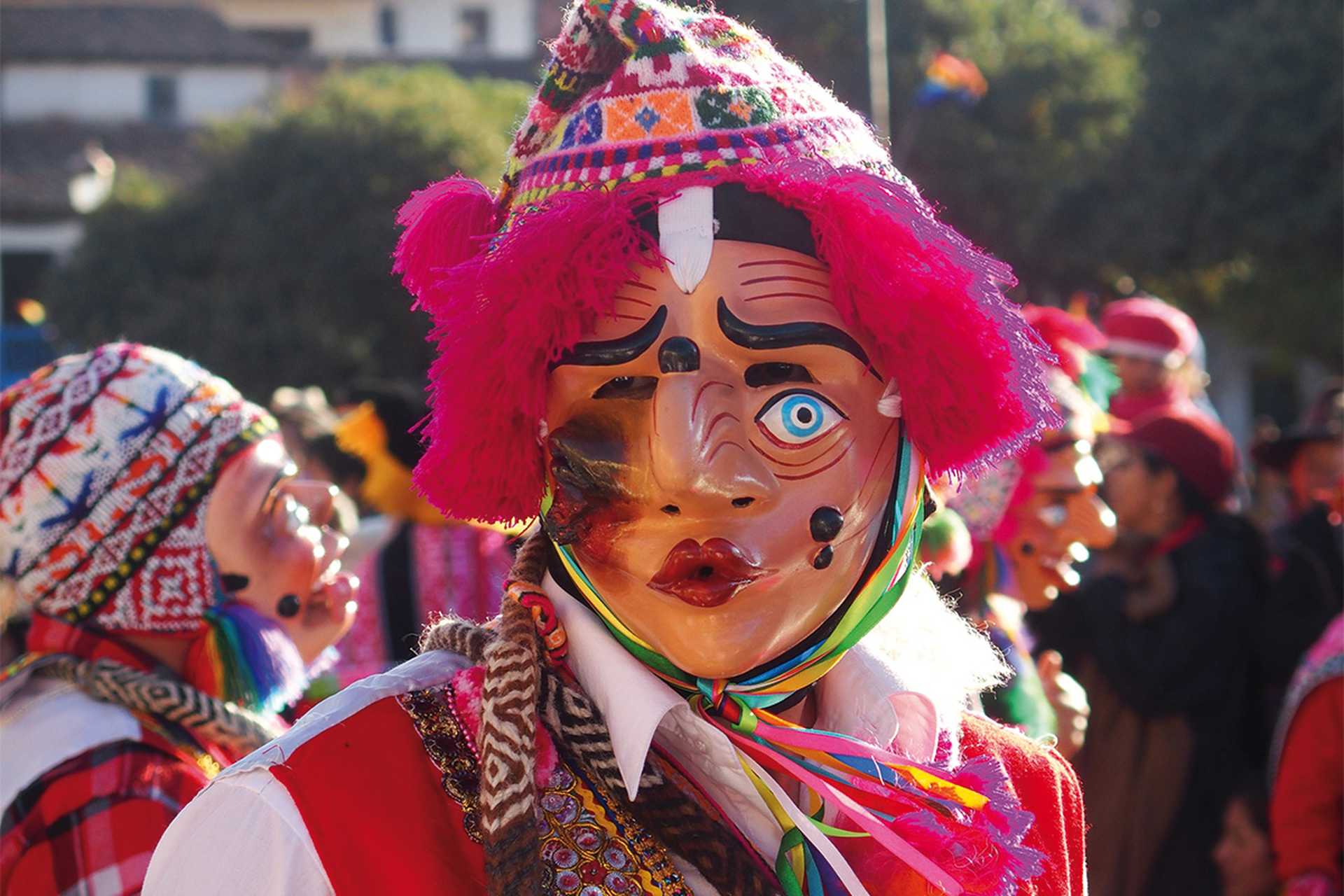 Man with a mask celebrating Inti Raymi in Peru