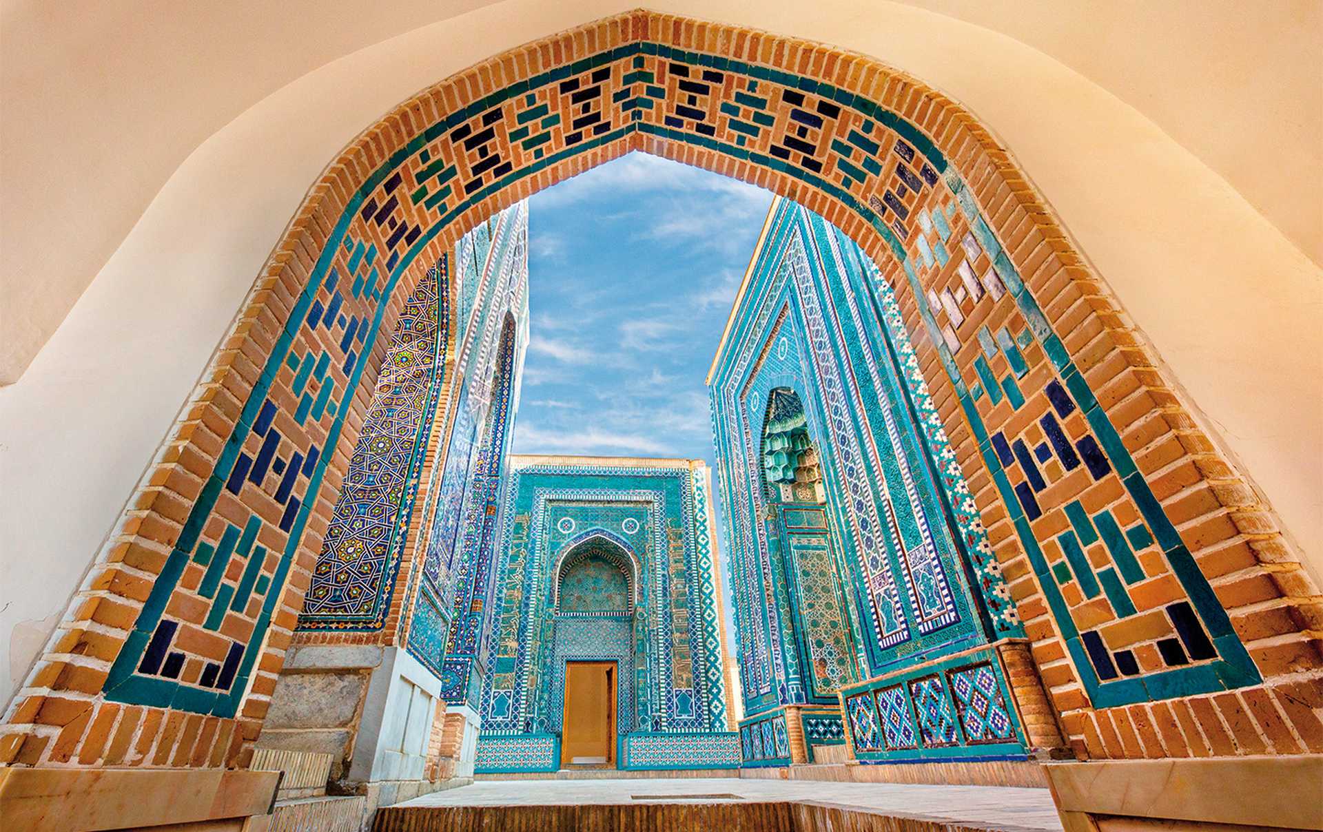 Historical cemetery of Shahi Zinda through an arch in Samarkand, Uzbekistan