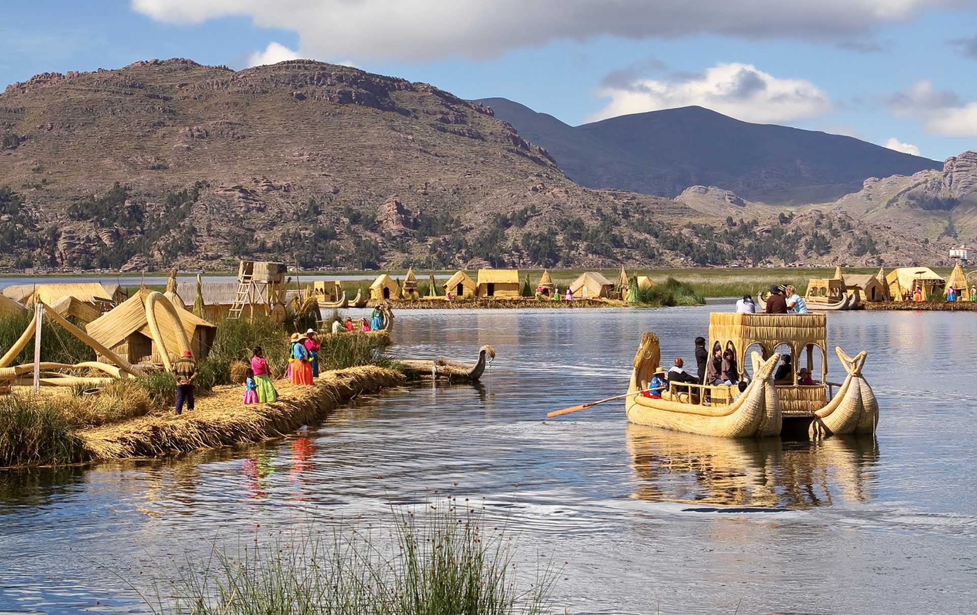 Uros people living on the floating islands of the Lake Titicaca in Peru.