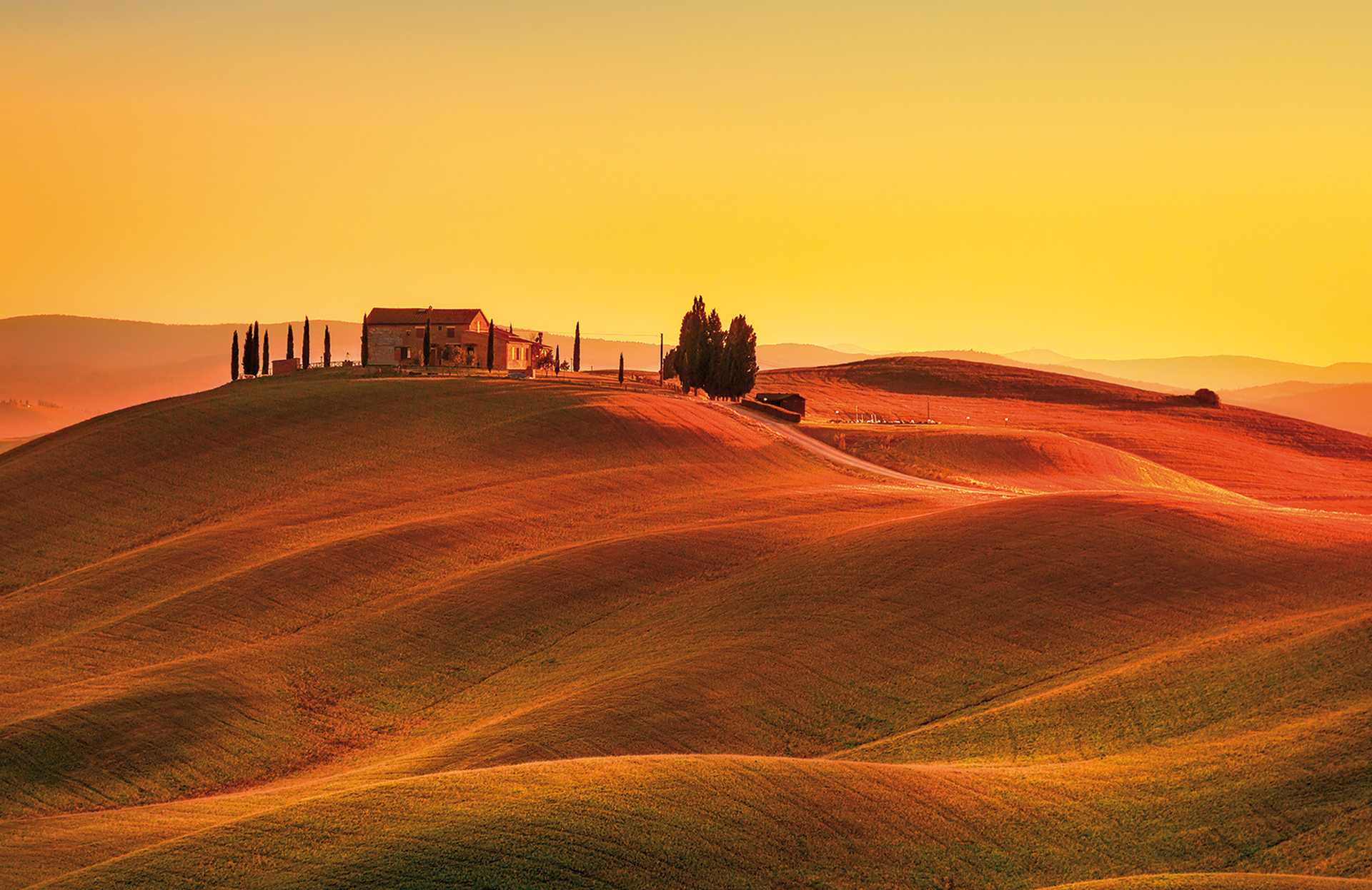 Tuscany, sunset rural landscape. Rolling hills, countryside farm