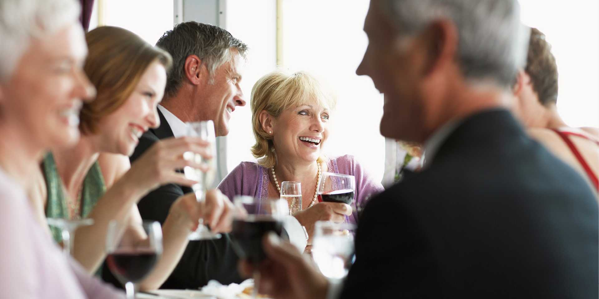 Friends Sharing a Laugh at Dinner