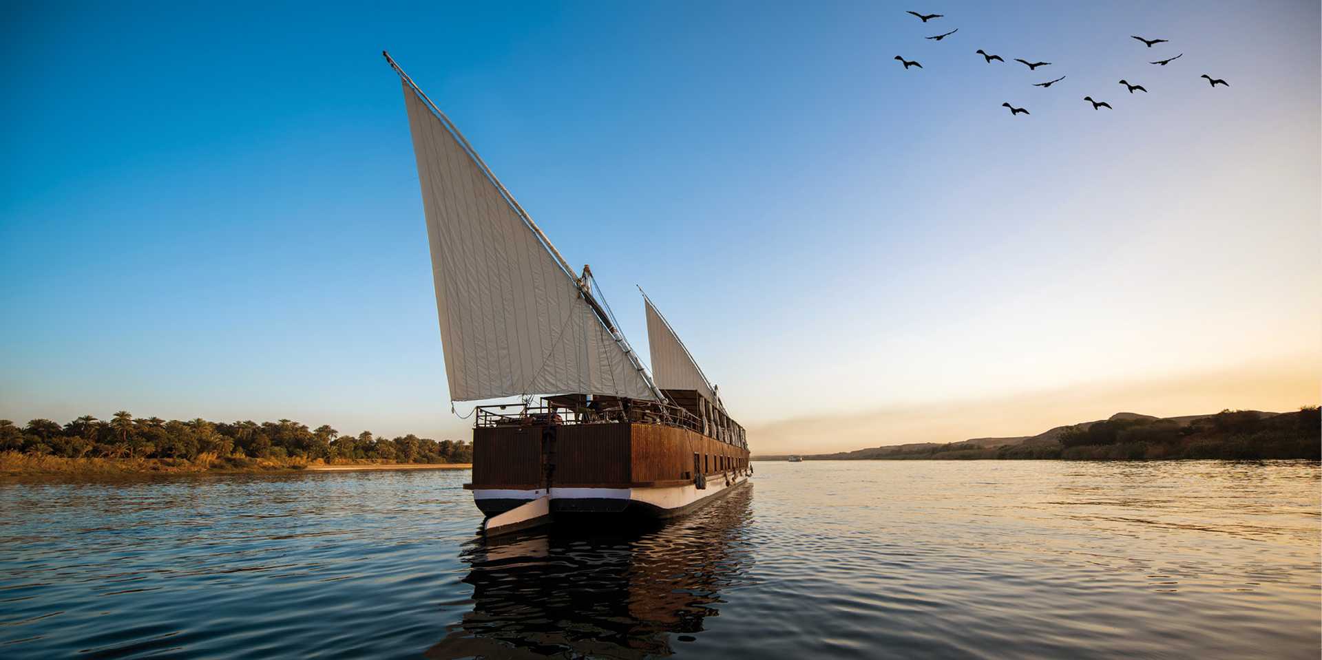 Dahabiya on the Nile River going to Aswan