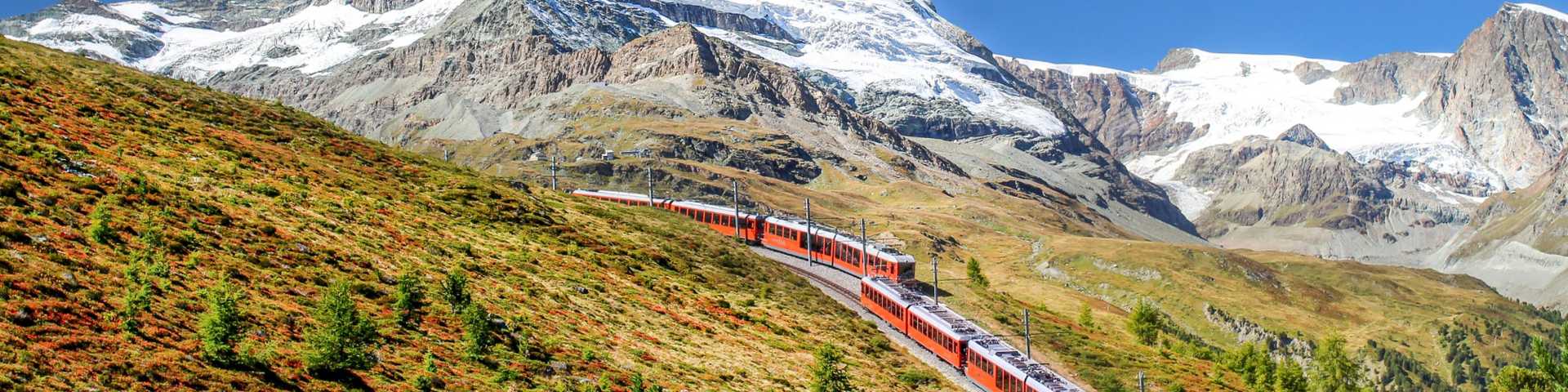 blue sky,  travel view,  beautiful nature landscape,  peak alps,  zermatt switzerland,  swiss railway,  eco tourism,  eco travel,  swiss alps,  scenery,  ecotourism,  beautiful nature mountain,  mountain train,  rock,  high,  gornergrat,  mountain landscape,  matterhorn,  railway,  switzerland landmark,  train,  gornergratbahn,  electric train,  eco transport,  alps autumn,  switzerland,  scenic drive,  alpine landscape,  gornergrat bahn,  transport,  scenic view,  transportation,  outdoor,  zermatt,  swiss train,  nature mountain,  alps vacation,  environmentally friendly,  autumn,  europe vacation,  eco vacation,  blue sky background