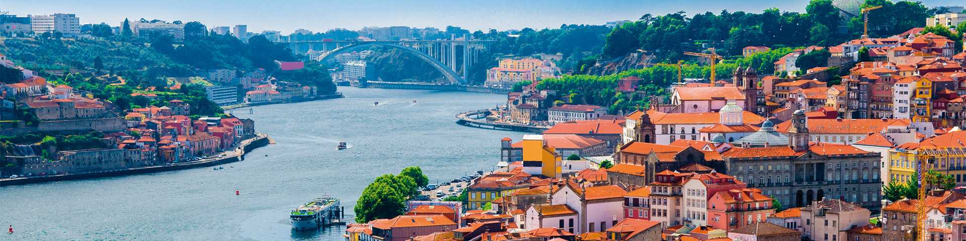 Panoramic view of Old Porto Oporto city and Ribeira over Douro river from Vila Nova de Gaia