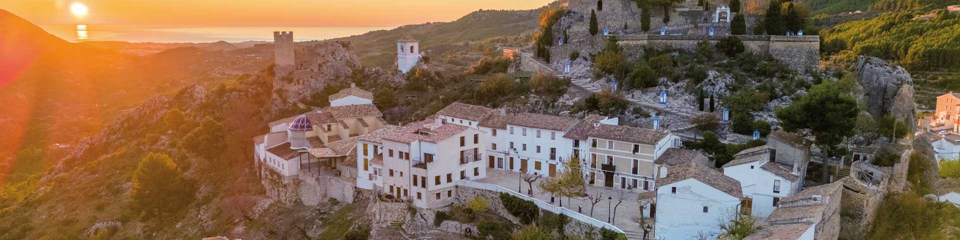 This is an aerial drone shot of Guadalest. a mountain town in the region of the costa blanca, Spain