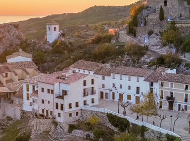 This is an aerial drone shot of Guadalest. a mountain town in the region of the costa blanca, Spain