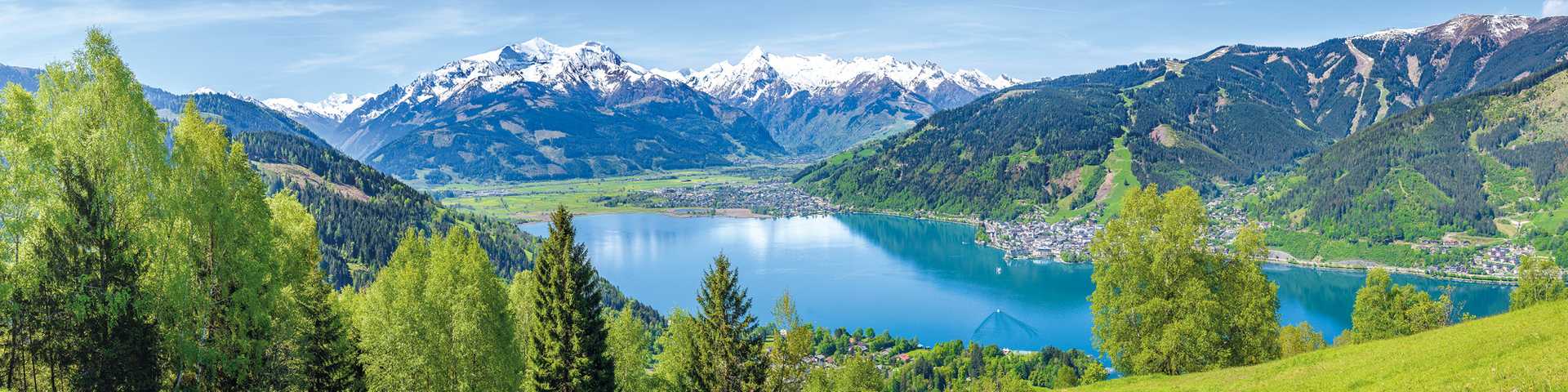 Zell am See against a snow topped mountain backdrop, Austria