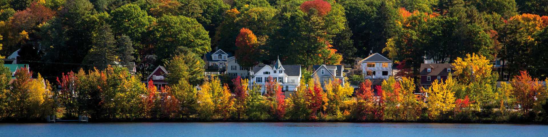Homes along the shore of Paugus Bay on Lake Winnipesaukee, near Laconia, New Hgampshire.