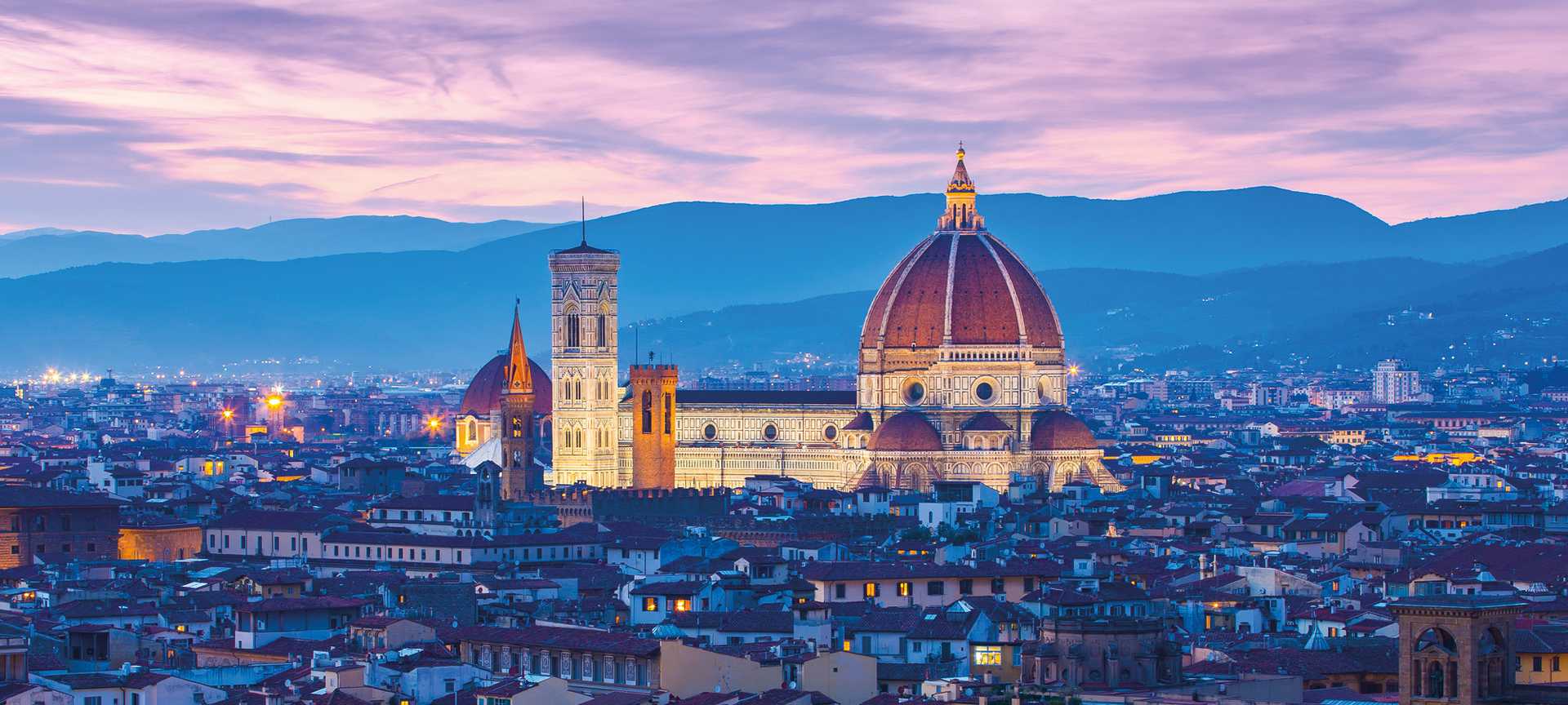Florence cathedral illuminated in the evening sunset, Italy
