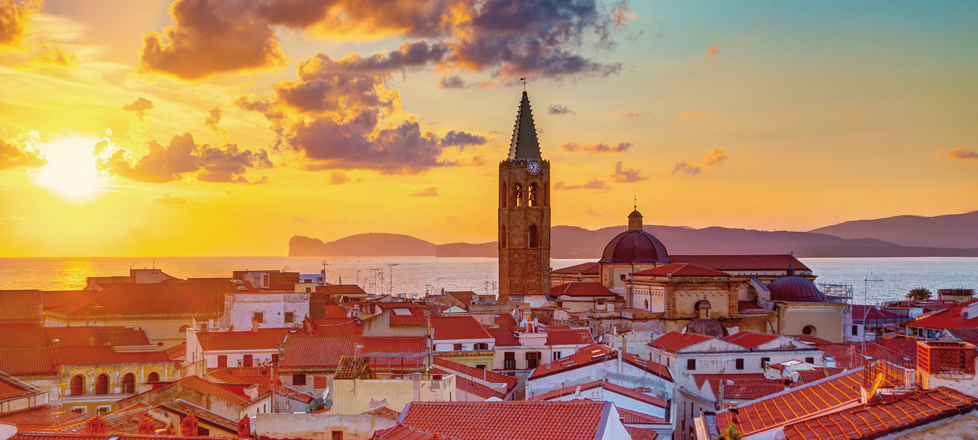Sunset over Alghero city