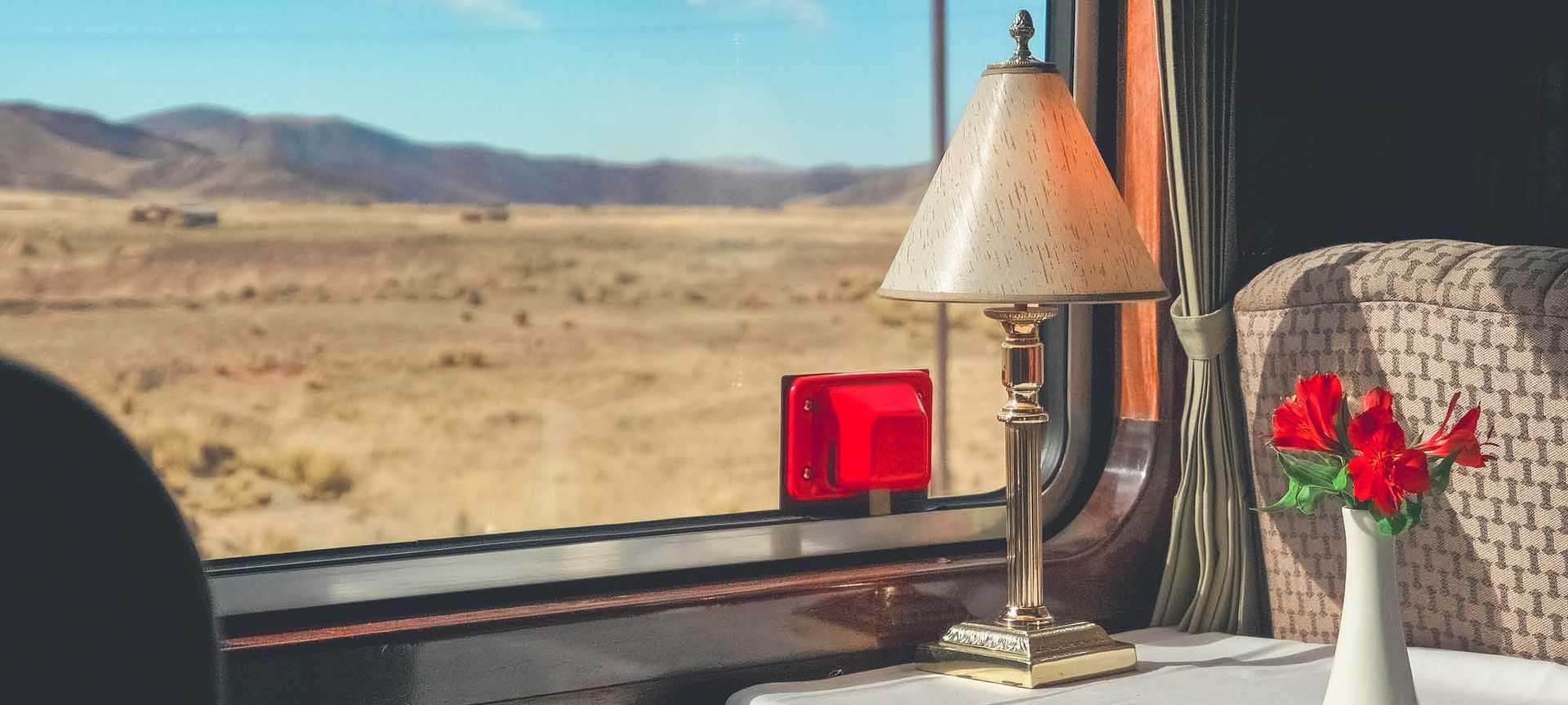 Looking out of the window of the Titicaca Train as it travels across Peru's Altiplano