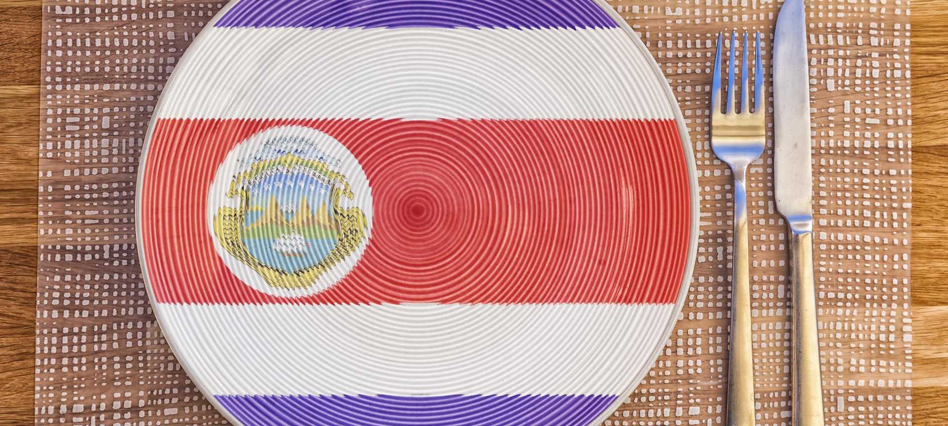 A dinner plate shows the flag of Costa Rica