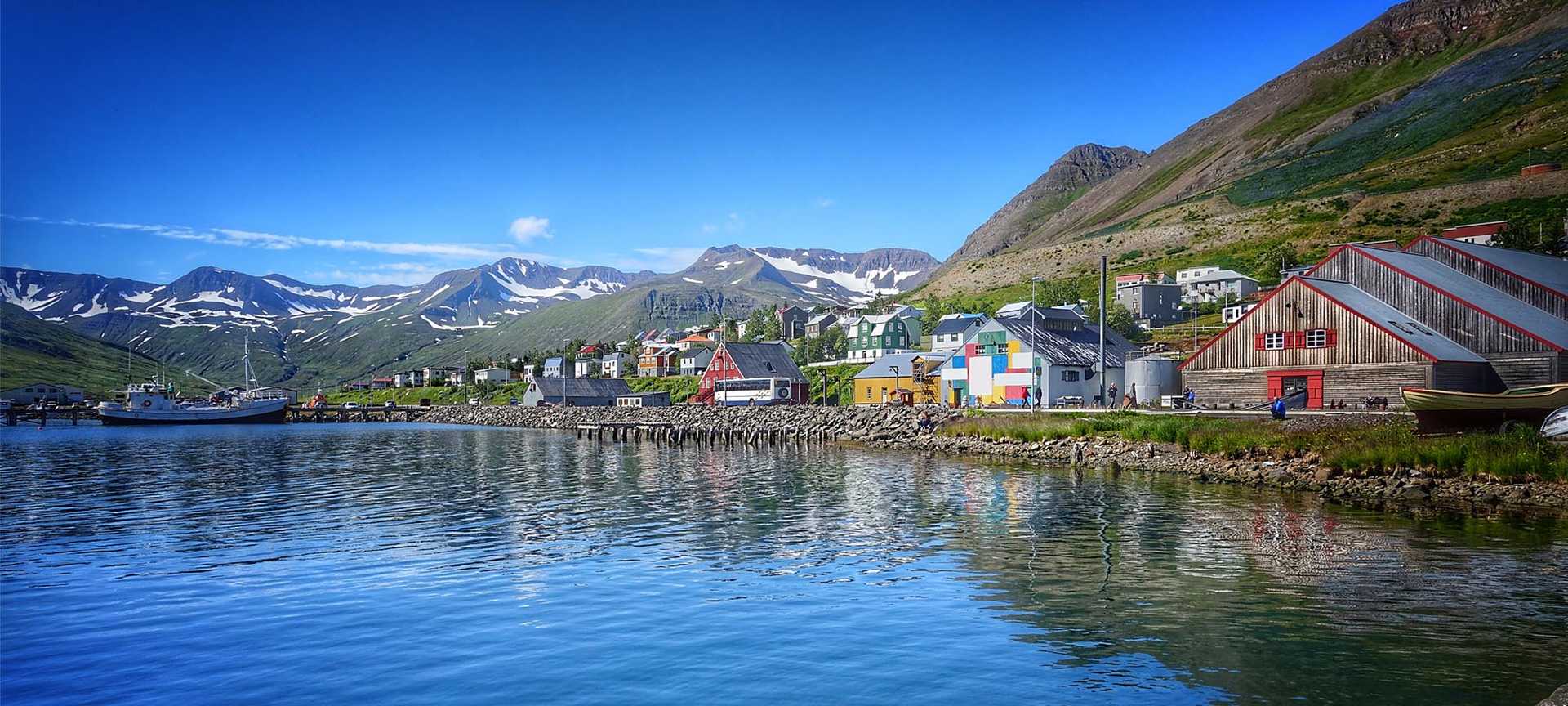 The little waterside town of Siglufjordur in northern Iceland on a sunny day
