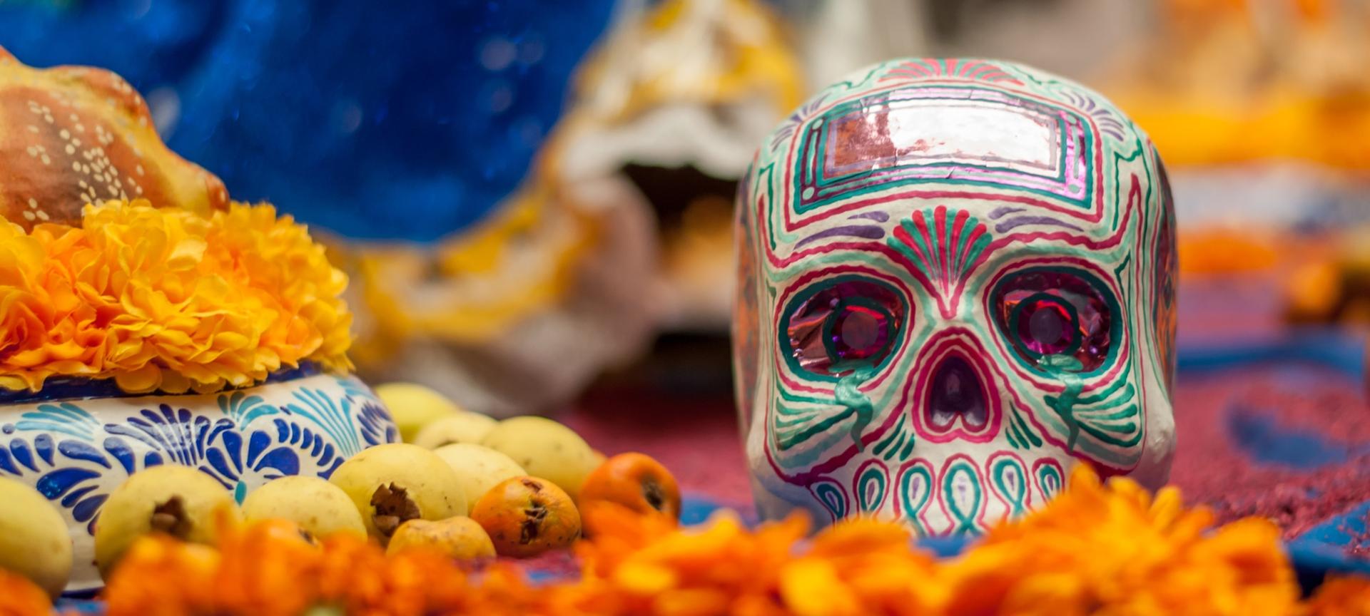 Sugar skulls and marigolds - traditional Day of the Dead offerings in Mexico