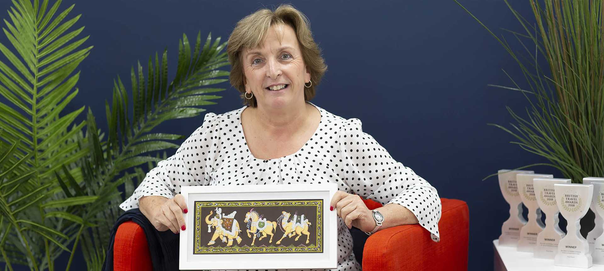 Titan travel advisor Michaela shows a souvenir from her solo traveller tour to India
