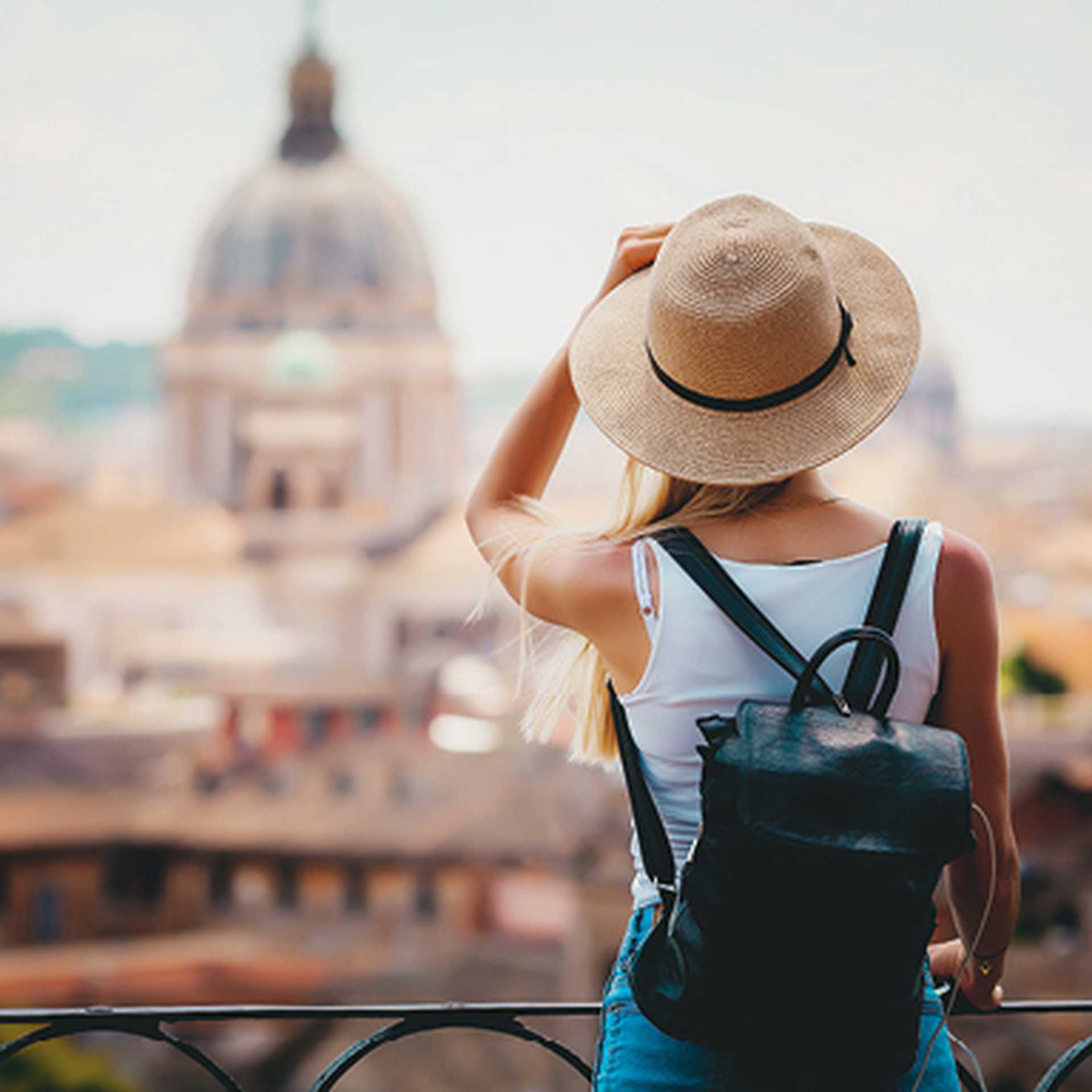 Tourist looking out at the Vatican in Rome, Italy